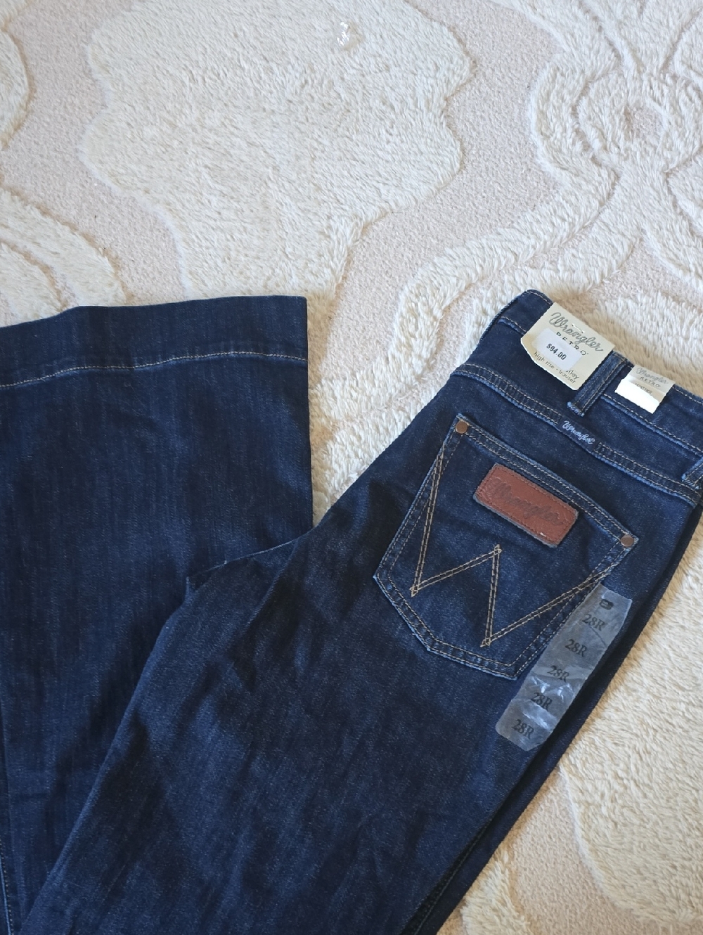 Wrangler Dark Indigo Bootcut Jeans with Leather Patch